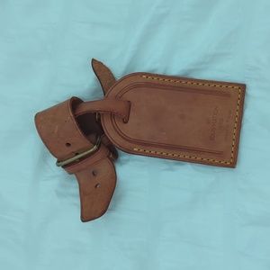 Louis Vuitton luggage tag and poignant